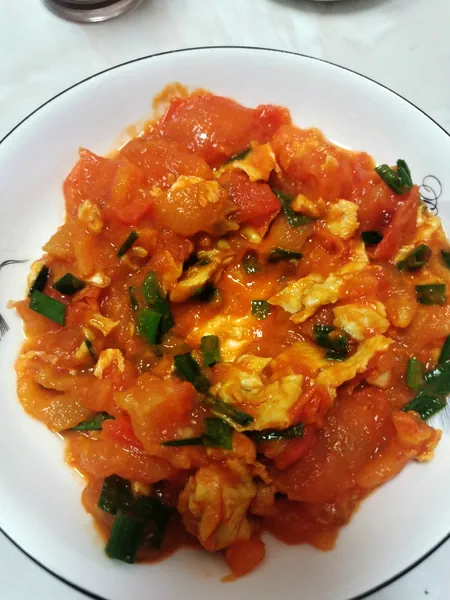 Foto del plato terminado de Porción individual·Huevos revueltos con tomate🍅