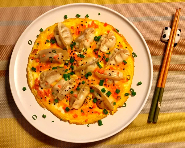 Foto del plato terminado de Raviolis fritos con huevos perfectos (versión congelada) 🥟